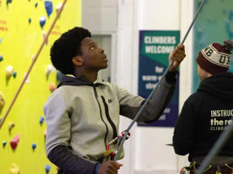 Younge person belaying